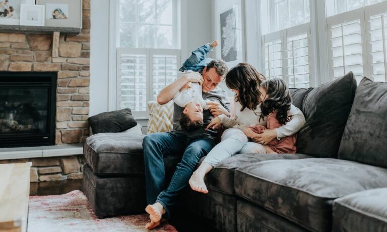 family together in home saved by bankruptcy lawyer