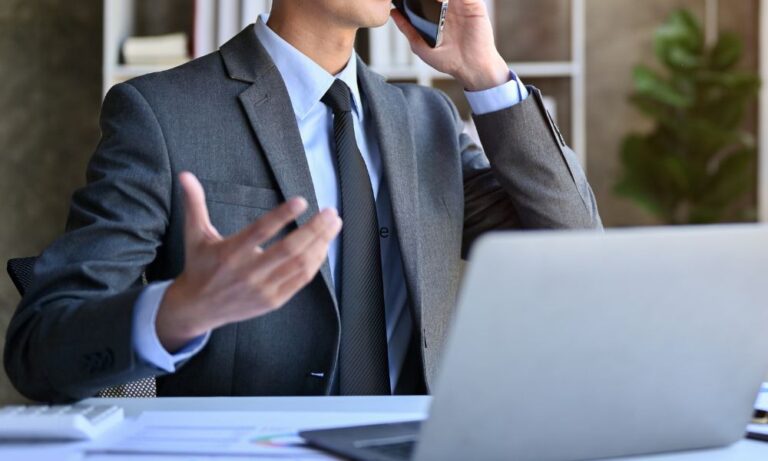 debt lawyer negotiating on the phone with creditor